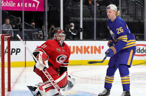 LAS VEGAS, NEVADA – FEBRUARY 04: Rasmus Dahlin #26 of the Buffalo Sabres collects the puck after attempting a shot against Frederik Andersen #31 of the Carolina Hurricanes in the Save Streak event during the 2022 NHL All-Star Skills at T-Mobile Arena on February 04, 2022, in Las Vegas, Nevada. (Photo by Ethan Miller/Getty Images)