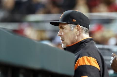 May 6, 2017; Cincinnati, OH, USA; San Francisco Giants manager Bruce Bochy watches from the dugout during a game against the Cincinnati Reds at Great American Ball Park. Mandatory Credit: David Kohl-USA TODAY Sports