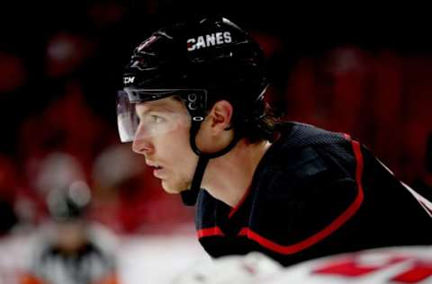 RALEIGH, NC – APRIL 15: Brock McGinn #23 of the Carolina Hurricanes prepares for a faceoff in Game Three of the Eastern Conference First Round during the 2019 NHL Stanley Cup Playoffs against the Washington Capitals on April 15, 2019 at PNC Arena in Raleigh, North Carolina. (Photo by Gregg Forwerck/NHLI via Getty Images)