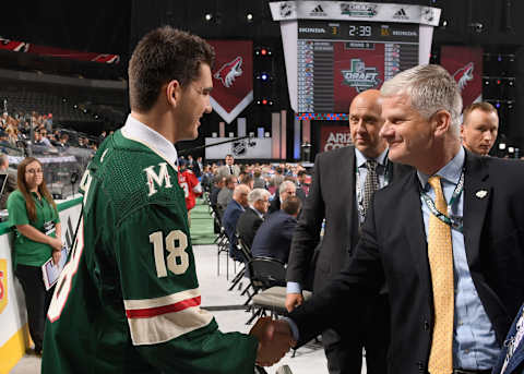 DALLAS, TX – JUNE 23: Jack McBain greets his team after being selected 63rd overall by the Minnesota Wild during the 2018 NHL Draft at American Airlines Center on June 23, 2018 in Dallas, Texas. (Photo by Brian Babineau/NHLI via Getty Images)