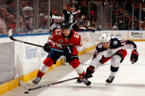 SUNRISE, FL – OCTOBER 11: Denis Malgin #62 of the Florida Panthers skates for possession against Lukas Sedlak #45 Columbus Blue Jackets at the BB&T Center on October 11, 2018 in Sunrise, Florida. (Photo by Eliot J. Schechter/NHLI via Getty Images)