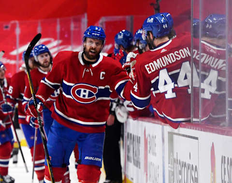 Jun 24, 2021; Montreal, Quebec, CAN; Montreal Canadiens defenseman Shea Weber (6) celebrates with teammates after scoring a goal against the Vegas Golden Knights during the first period in game six of the 2021 Stanley Cup Semifinals at the Bell Centre. Mandatory Credit: Eric Bolte-USA TODAY Sports