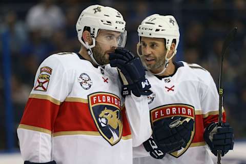 TAMPA, FL – SEPTEMBER 25: Florida Panthers defenseman Keith Yandle (3) and Florida Panthers center Derek MacKenzie (17) in the first period of the NHL preseason game between the Florida Panthers and Tampa Bay Lightning on September 25, 2018, at Amalie Arena in Tampa, FL. (Photo by Mark LoMoglio/Icon Sportswire via Getty Images)