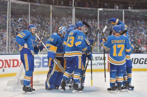 NHL Power Rankings: St. Louis Blues players celebrate with goalie Jake Allen (34) after defeating the Chicago Blackhawks in the 2016 Winter Classic ice hockey game at Busch Stadium. Mandatory Credit: Jasen Vinlove-USA TODAY Sports