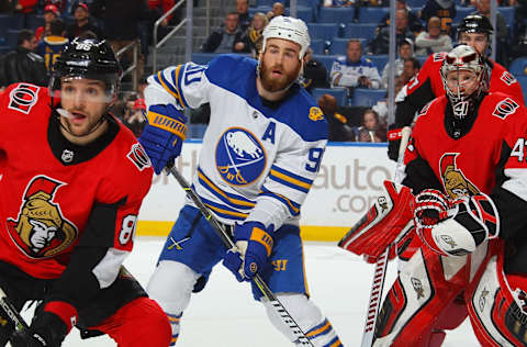 BUFFALO, NY – APRIL 4: Christian Wolanin #86 and Craig Anderson #41 of the Ottawa Senators defend the net against Ryan O’Reilly #90 of the Buffalo Sabres during an NHL game on April 4, 2018 at KeyBank Center in Buffalo, New York. (Photo by Bill Wippert/NHLI via Getty Images)