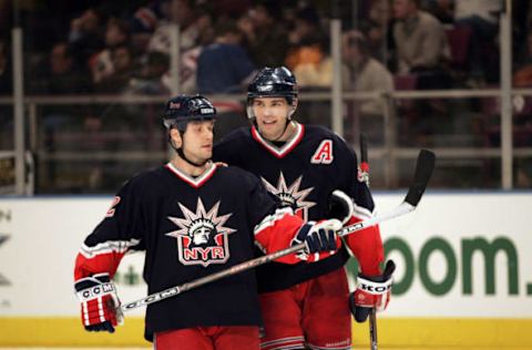 Martin Straka listens to some advice from Jaromir Jagr as the New York Rangers prepared to play the Tamps Bay Lightning at Madison Square Garden in New York December 22, 2005 (Photo by Dave Saffran/NHLImages)