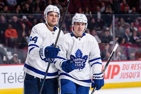 MONTREAL, QC – SEPTEMBER 26: Toronto Maple Leafs center Mitchell Marner (16) and Auston Matthews (34) celebrate during the third period of the NHL preseason game between the Toronto Maple Leafs and the Montreal Canadiens on September 26, 2018, at the Bell Centre in Montreal, QC (Photo by Vincent Ethier/Icon Sportswire via Getty Images)