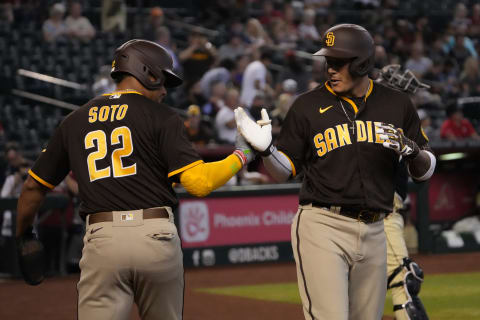 Sep 18, 2022; Phoenix, Arizona, USA; San Diego Padres designated hitter Manny Machado (13) celebrates with San Diego Padres right fielder Juan Soto (22) after hitting a two-run home run against the Arizona Diamondbacks during the first inning at Chase Field. Mandatory Credit: Joe Camporeale-USA TODAY Sports