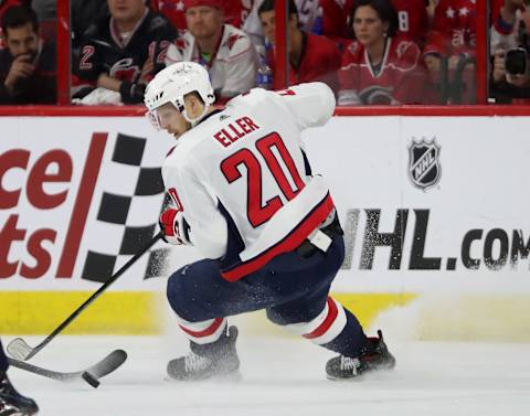 RALEIGH, NC – APRIL 18: Lars Eller #20 of the Washington Capitals plays a puck in the offensive zone in Game Four of the Eastern Conference First Round against the Carolina Hurricanes during the 2019 NHL Stanley Cup Playoffs on April 18, 2019 at PNC Arena in Raleigh, North Carolina. (Photo by Gregg Forwerck/NHLI via Getty Images)