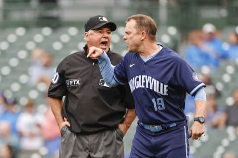 Sep 3, 2021; Chicago, Illinois, USA; Chicago Cubs bench coach Andy Green (19) argues with umpire Tom Hallion (20) after Hallion ejected Green from a baseball game against the Pittsburgh Pirates during the sixth inning at Wrigley Field. Mandatory Credit: Kamil Krzaczynski-USA TODAY Sports