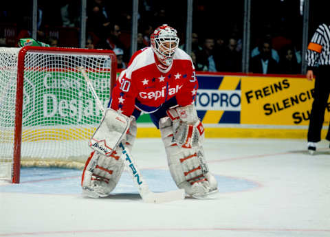 MONTREAL, CANADA – CIRCA 1996: Jim Carey #30 of the Washington Capitals follows the action during a game against the Montreal Canadiens Circa 1996 at the Montreal Forum in Montreal, Quebec, Canada. (Photo by Denis Brodeur/NHLI via Getty Images)