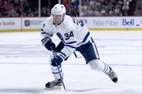 Oct 29, 2016; Montreal, Quebec, CAN; Toronto Maple Leafs forward Auston Matthews (34) plays the puck during the third period of the game against the Montreal Canadiens at the Bell Centre. Mandatory Credit: Eric Bolte-USA TODAY Sports