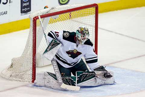 Apr 6, 2017; Denver, CO, USA; Minnesota Wild goalie Devan Dubnyk (40) makes a save in the first period against the Colorado Avalanche at the Pepsi Center. Mandatory Credit: Isaiah J. Downing-USA TODAY Sports