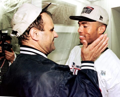 New York Yankees manager Joe Torre and closer Mariano Rivera (TIMOTHY A. CLARY/AFP via Getty Images)