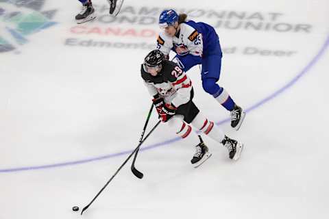 EDMONTON, AB – DECEMBER 27: Jack Quinn #29 of Canada skates against Michal Mrazik #25 of Slovakia during the 2021 IIHF World Junior Championship at Rogers Place on December 27, 2020 in Edmonton, Canada. (Photo by Codie McLachlan/Getty Images)