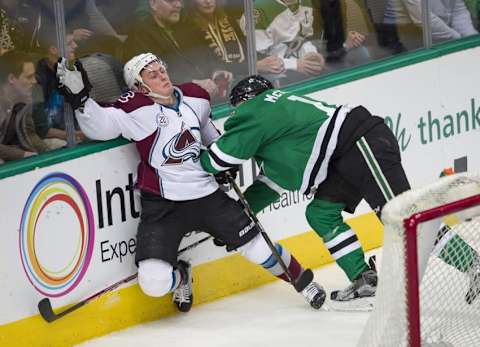 Apr 7, 2016; Dallas, TX, USA; Dallas Stars left wing Curtis McKenzie (11) checks Colorado Avalanche defenseman Tyson Barrie (4) during the first period at the American Airlines Center. Mandatory Credit: Jerome Miron-USA TODAY Sports