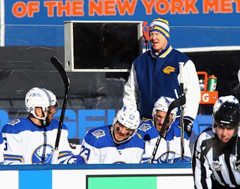 NEW YORK, NY – JANUARY 01: Phil Housley of the Buffalo Sabres handles bench duties against the New York Rangers during the 2018 Bridgestone NHL Winter Classic at Citi Field on January 1, 2018 in the Flushing neighborhood of the Queens borough of New York City. The Rangers defeated the Sabres 3-2 in overtime. (Photo by Bruce Bennett/Getty Images)