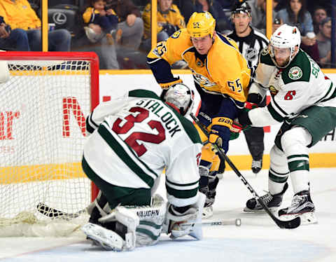 Apr 1, 2017; Nashville, TN, USA; Minnesota Wild goalie Alex Stalock (32) saves a shot by Nashville Predators left wing Cody McLeod (55) during the second period at Bridgestone Arena. Mandatory Credit: Christopher Hanewinckel-USA TODAY Sports