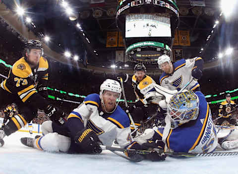 BOSTON, MASSACHUSETTS – JUNE 06: Carl Gunnarsson #4 and Jordan Binnington #50 of the St. Louis Blues defend the goal against the Boston Bruins during the third period in Game Five of the 2019 NHL Stanley Cup Final at TD Garden on June 06, 2019 in Boston, Massachusetts. (Photo by Bruce Bennett/Getty Images)