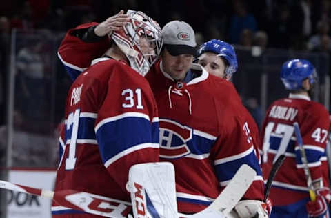 Oct 20, 2016; Montreal, Quebec, CAN; Montreal Canadiens goalie Carey Price (31) reacts with teammates including goalie Al Montoya (35) after defeating the Arizona Coyotes at the Bell Centre. Mandatory Credit: Eric Bolte-USA TODAY Sports