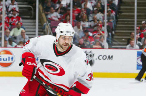 EAST RUTHERFORD, NJ – MAY 10: Doug Weight #39 of the Carolina Hurricanes skates against the New Jersey Devils in game three of the Eastern Conference Semifinals during the 2006 NHL Playoffs on May 10, 2006, at Continental Airlines Arena in East Rutherford, New Jersey. The Hurricanes won 3-2. (Photo by Jim McIsaac/Getty Images)