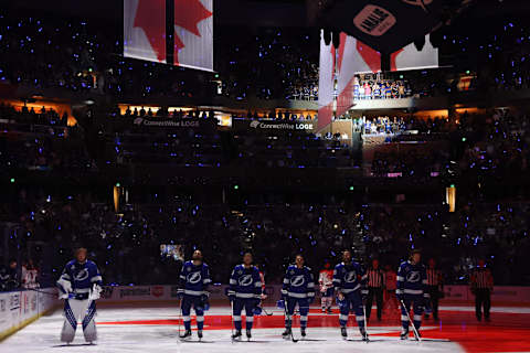 The Tampa Bay Lightning stand for the national anthem. (Photo by Bruce Bennett/Getty Images)