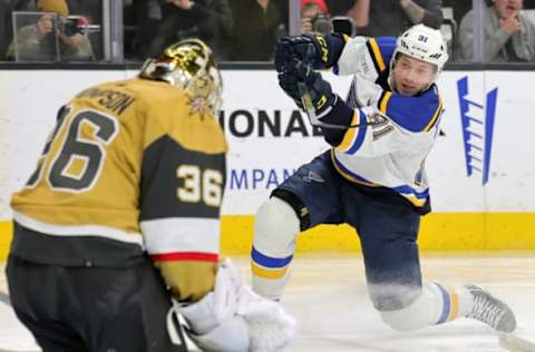 LAS VEGAS, NEVADA – DECEMBER 23: Vladimir Tarasenko #91 of the St. Louis Blues takes a shot against Logan Thompson #36 of the Vegas Golden Knights in the first period of their game at T-Mobile Arena on December 23, 2022, in Las Vegas, Nevada. (Photo by Ethan Miller/Getty Images)