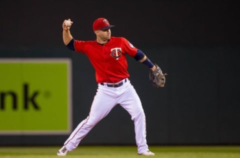 Sep 23, 2016; Minneapolis, MN, USA; Minnesota Twins second baseman Brian Dozier (2) throws to first base in the first inning against the Seattle Mariners at Target Field. Mandatory Credit: Brad Rempel-USA TODAY Sports