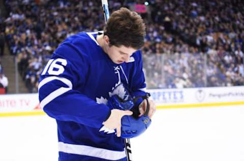 TORONTO, ON - APRIL 04: Toronto Maple Leafs right wing Mitchell Marner (16) adjusts his helmet during the third period in a game between the Tampa Bay Lightning and the Toronto Maple Leafs on April 04, 2019, at the Scotiabank Arena in Toronto, Ontario Canada. The Tampa Bay Lightning won 3-1. (Photo by Nick Turchiaro/Icon Sportswire via Getty Images)