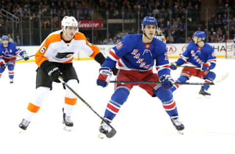 NEW YORK, NY – DECEMBER 23: Chris Kreider #20 of the New York Rangers skates against Travis Sanheim #6 of the Philadelphia Flyers at Madison Square Garden on December 23, 2018 in New York City. (Photo by Jared Silber/NHLI via Getty Images)