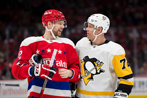 WASHINGTON, DC – FEBRUARY 02: Evgeny Kuznetsov #92 of the Washington Capitals speaks with Patric Hornqvist #72 of the Pittsburgh Penguins during the third period at Capital One Arena on February 2, 2020 in Washington, DC. (Photo by Scott Taetsch/Getty Images)