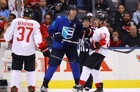 TORONTO, ON – SEPTEMBER 29: Zdeno Chara #33 of Team Europe and Brad Marchand #63 of Team Canada get tangled up during the first period during Game Two of the World Cup of Hockey final series at the Air Canada Centre on September 29, 2016 in Toronto, Canada. (Photo by Bruce Bennett/Getty Images)