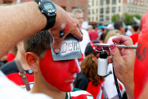 Jake Klerer of Bellmore, New York has his face painted. (Photo by Paul Bereswill/Getty Images)