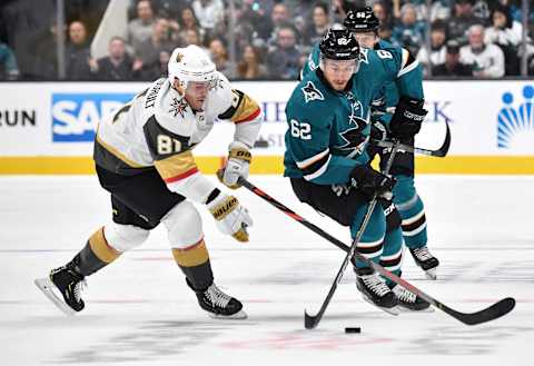 SAN JOSE, CA – OCTOBER 04: Kevin Labanc #62 of the San Jose Sharks skates ahead with the puck against Jonathan Marchessault #81 of the Vegas Golden Knights at SAP Center on October 4, 2019 in San Jose, California. (Photo by Brandon Magnus/NHLI via Getty Images)