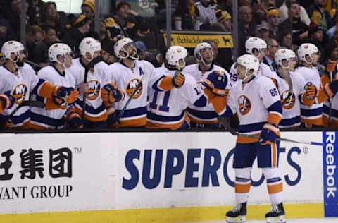 NHL Power Rankings: New York Islanders left wing Nikolay Kulemin (86) is congratulated by teammates after scoring a goal during the second period against the Boston Bruins at TD Garden. Mandatory Credit: Bob DeChiara-USA TODAY Sports