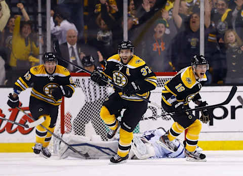 BOSTON, MA – MAY 13: Patrice Bergeron #37, Tyler Seguin #19, and Brad Marchand #63 of the Boston Bruins celebrate following Bergeron’s game-winning overtime goal against the Toronto Maple Leafs in Game Seven of the Eastern Conference Quarterfinals during the 2013 NHL Stanley Cup Playoffs on May 13, 2013, at TD Garden in Boston, Massachusetts. (Photo by Jared Wickerham/Getty Images)