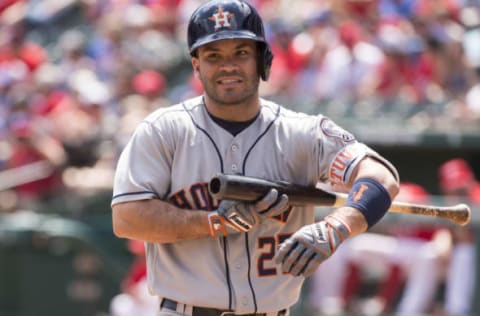 Sep 4, 2016; Arlington, TX, USA; Houston Astros designated hitter Jose Altuve (27) bats against the Texas Rangers during the first inning at Globe Life Park in Arlington. Mandatory Credit: Jerome Miron-USA TODAY Sports