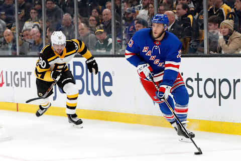 BOSTON, MA – MARCH 27: Boston Bruins left wing Marcus Johansson (90) chases New York Rangers defenseman Fredrik Claesson (33) during a game between the Boston Bruins and the New York Rangers on March 27, 2019, at TD Garden in Boston, Massachusetts. (Photo by Fred Kfoury III/Icon Sportswire via Getty Images)