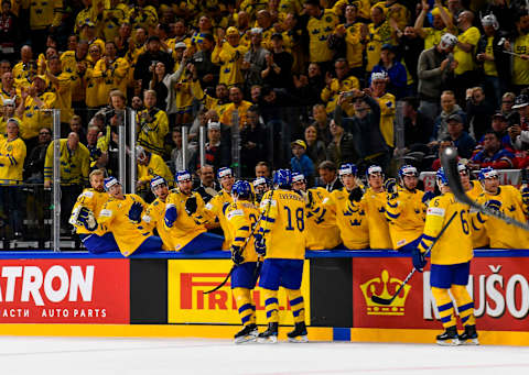 Sweden’s Lias Andersson (L) celebrates with his teammates after scoring a goal during the 2018 IIHF Men’s Ice Hockey World Championship match between Sweden and Belarus on May 4, 2018 in Copenhagen. (Photo by Jonathan NACKSTRAND / AFP) (Photo credit should read JONATHAN NACKSTRAND/AFP/Getty Images)