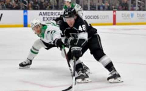 Jan 19, 2023; Los Angeles, California, USA; Los Angeles Kings left wing Brendan Lemieux (48) is defended by Dallas Stars defenseman Colin Miller (6) as he skates the puck down ice in the second period at Crypto.com Arena. Mandatory Credit: Jayne Kamin-Oncea-USA TODAY Sports