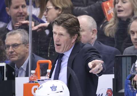 Mar 11, 2019; Toronto, Ontario, CAN; Toronto Maple Leafs head coach Mike Babcock reacts from the bench during their game against the Tampa Bay Lightning at Scotiabank Arena. The Lightning beat the Maple Leafs 6-2. Mandatory Credit: Tom Szczerbowski-USA TODAY Sports