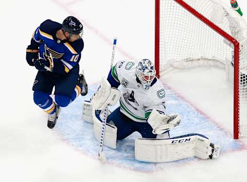 Brayden Schenn of St. Louis Blues  screens Vancouver Canucks’ Jacob Markstrom (Photo by Jeff Vinnick/Getty Images)