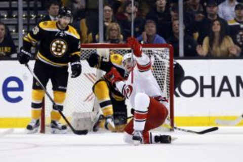 Mar 10, 2016; Boston, MA, USA; Carolina Hurricanes left wing Phillip Di Giuseppe (34) celebrates after scoring the winning goal on Boston Bruins goalie Tuukka Rask (not pictured) during the overtime period at TD Garden. The Carolina Hurricanes won 3-2 in overtime. Mandatory Credit: Greg M. Cooper-USA TODAY Sports