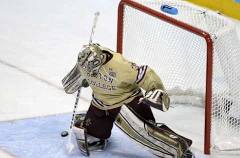 Apr 10, 2014; Philadelphia, PA, USA; Boston College Eagles goalie Thatcher Demko (30) makes a save against the Union Dutchmen during the second period in the semifinals of the Frozen Four college ice hockey tournament at Wells Fargo Center. Mandatory Credit: Eric Hartline-USA TODAY Sports