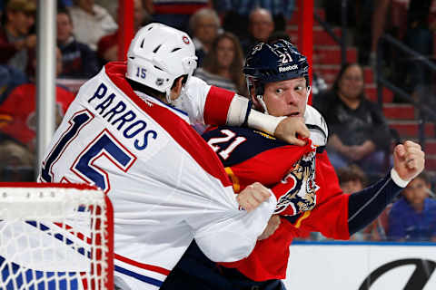 George Parros of the Montreal Canadiens fights Krys Barch of the Florida Panthers in 2014 (Photo by Joel Auerbach/Getty Images)