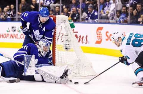 Dec 13, 2016; Toronto, Ontario, CAN; Toronto Maple Leafs Frederik Andersen (31) saves a shot by San Jose Sharks left wing Mikkel Boedker (89) at Air Canada Centre. The Sharks beat the Maple Leafs 3-2 in the shootout. Mandatory Credit: Tom Szczerbowski-USA TODAY Sports