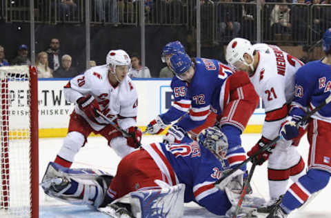 NEW YORK, NEW YORK – NOVEMBER 27: Henrik Lundqvist #30 of the New York Rangers tends net against the Carolina Hurricanes during the first period while playing in his 1000th NHL game at Madison Square Garden on November 27, 2019 in New York City. (Photo by Bruce Bennett/Getty Images)