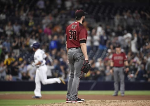 SAN DIEGO, CA – SEPTEMBER 20: Robbie Ray #38 of the Arizona Diamondbacks looks up at the scoreboard after giving up a solo home run to Hunter Renfroe #10 of the San Diego Padres during the fifth inning of a baseball game at PETCO Park on September 20, 2017 in San Diego, California. (Photo by Denis Poroy/Getty Images)