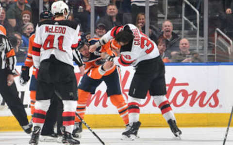 EDMONTON, AB – MARCH 13: Milan Lucic #27 of the Edmonton Oilers fights with Kurtis Gabriel #39 of the New Jersey Devils on March 13, 2019, at Rogers Place in Edmonton, Alberta, Canada. (Photo by Andy Devlin/NHLI via Getty Images)