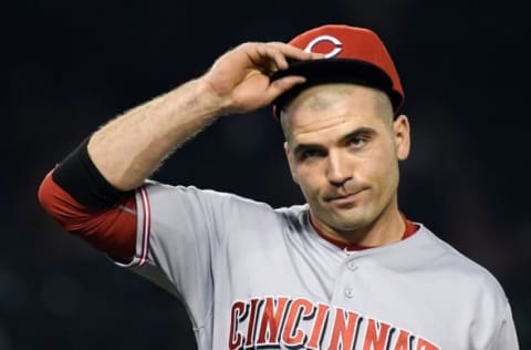 Aug 30, 2016; Anaheim, CA, USA; Cincinnati Reds first baseman Votto (19) reacts as he walks back to the dugout after the third inning of the game against the Los Angeles Angels at Angel Stadium of Anaheim. Mandatory Credit: Jayne Kamin-Oncea-USA TODAY Sports